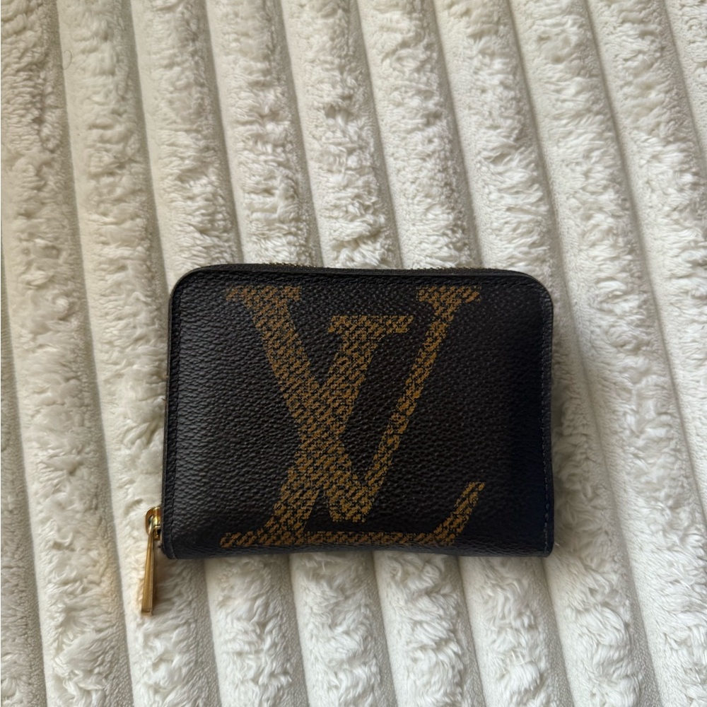 Louis Vuitton Black Wallet with Gold Logo